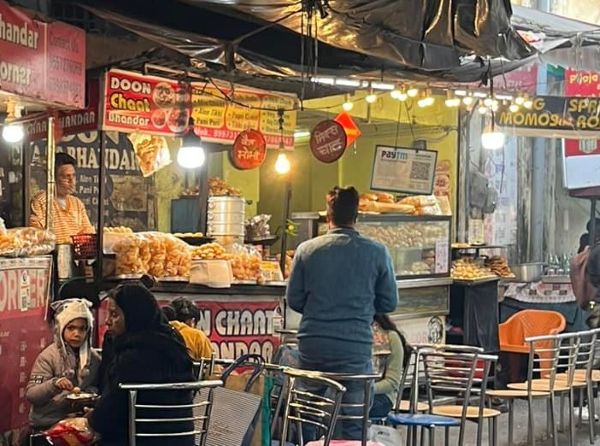 Street food stalls in evening lights